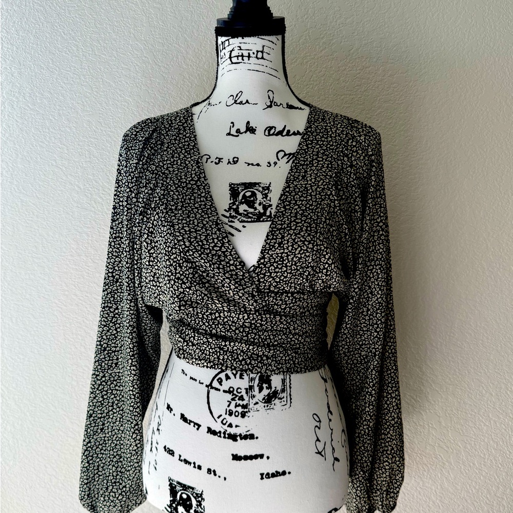 Polly 
Black and White Fitted Wrap Blouse